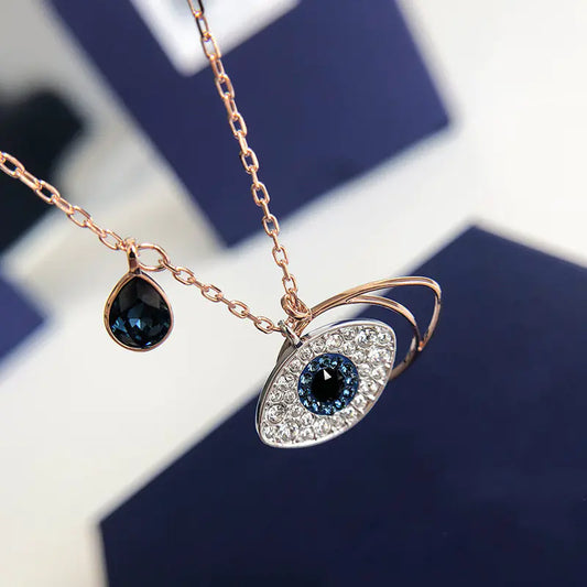 Evil Eye Necklace with Blue Crystal and Key Design